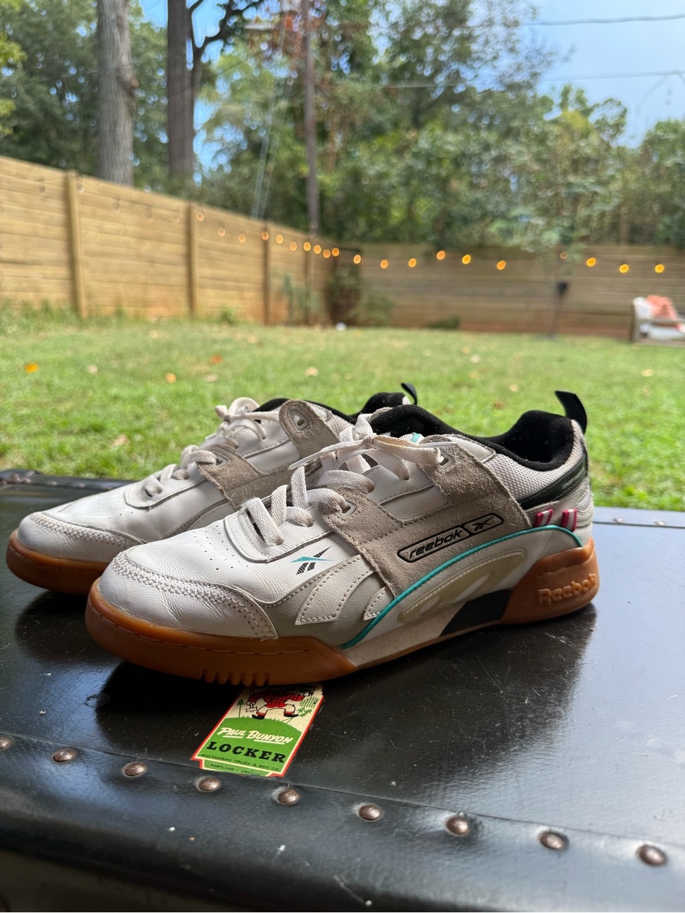 Reebok Men’s White Leather Athletic Shoes with Gum Soles and Teal Accent